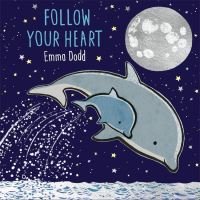 Children's book "Follow Your Heart" with dolphins under a starry sky and large moon.