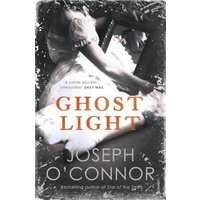 "Ghost Light book by Joseph O'Connor, cover with a vintage photo of a woman in a white dress, distressed edges"