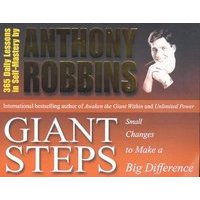 "Giant Steps book by Anthony Robbins, featuring a black and orange cover with a portrait of the author."
