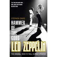 "Black and white book cover of 'Hammer of the Gods' with Led Zeppelin performing on stage, yellow and white text."
