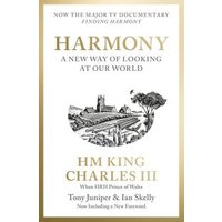 Book titled "Harmony" by HM King Charles III, featuring a black and white illustration of a rural landscape.