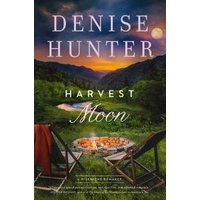 "Harvest Moon book by Denise Hunter, cover with chairs by a fire pit under a moonlit sky in a valley."