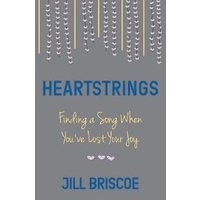 Gray book cover titled "Heartstrings" by Jill Briscoe, with gold and blue text and small heart designs.