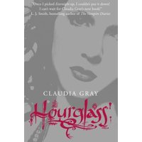 "Gray book cover with red title 'Hourglass' by Claudia Gray, featuring a grayscale face in the background."