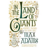 Book cover of "In the Land of Giants" with ornate green and gold lettering and decorative illustrations.