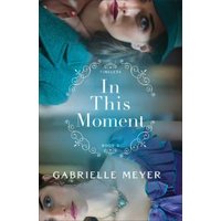 Novel "In This Moment" by Gabrielle Meyer, featuring a woman in a teal outfit and hat, ornate text design on cover.