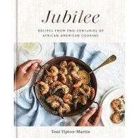 "Jubilee cookbook with shrimp dish on cover, hands holding skillet, white background"