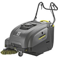 Gray Kärcher KM 75/40 W G sweeper with dual handles, black wheels, and side brush, compact design.
