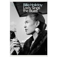 Black and white book cover of "Lady Sings the Blues" featuring a woman in a fur coat with large earrings.