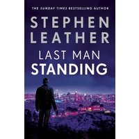 "Stephen Leather's 'Last Man Standing' book cover with silhouette of a man overlooking a cityscape at dusk"
