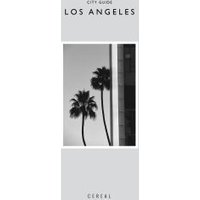 Gray "Los Angeles" city guidebook featuring black and white palm trees and building on cover.