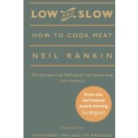 "Green book titled 'Low and Slow' by Neil Rankin, featuring gold text and a circular orange sticker on the cover"