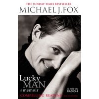 "Black and white cover of 'Lucky Man' memoir by Michael J. Fox, featuring his smiling portrait and red title text"