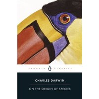 Paperback of "On the Origin of Species" by Charles Darwin, featuring a colorful toucan illustration on the cover.