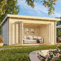 Wooden log cabin garden office with large windows, flat roof, and light wood finish, set in a garden with a sofa inside.