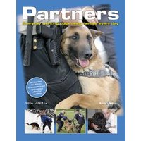 Book cover titled "Partners" featuring a police dog in a harness, with smaller images of dogs in action below.