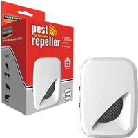White Pest-Stop Systems pest repeller with curved design and black speaker grill, next to red and gray packaging.