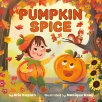 Children's book "Pumpkin Spice" with a girl in pumpkin attire and a smiling pumpkin, surrounded by autumn leaves and sunflowers.