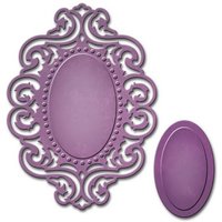 Ornate purple oval mirror frame with intricate scrollwork and matching plain oval insert.