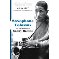 Book cover of "Saxophone Colossus" featuring a black-and-white photo of a man holding a saxophone, blue and white text.