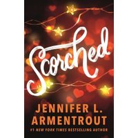 "Scorched book cover with glowing bokeh lights and cursive title, author Jennifer L. Armentrout in bold letters"