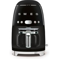 Black Smeg drip coffee machine with chrome accents, glass carafe, and retro design.