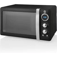Black Swan Retro 800W digital microwave with chrome accents, round digital display, and two control knobs.