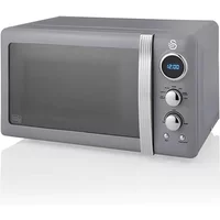 Grey Swan Retro 800W digital microwave with chrome accents, round digital display, and two control knobs.
