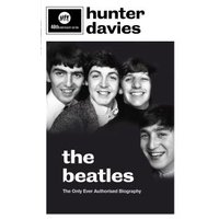 Black and white book cover titled "The Beatles" by Hunter Davies featuring four smiling men.
