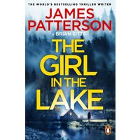 "The Girl in the Lake" book by Cornerstone, features a cabin by a misty lake with trees and a dark blue sky.