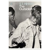 Paperback of "The Outsiders" by S.E. Hinton, featuring two young men with cigarettes, one in a white shirt.