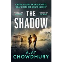 "The Shadow" book cover with two figures walking, cityscape background, and glowing light between them.