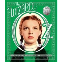 Green hardcover book "The Wizard of Oz" with a portrait of a girl in braids, 75th anniversary edition.