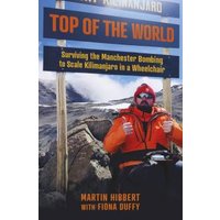 "Book 'Top of the World' with cover showing a man in an orange jacket in a mountainous landscape"