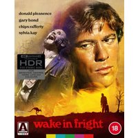 "Wake in Fright Blu-ray by Arrow Video, features dramatic artwork with a man's face and desert scene, HDR sticker, age 18 rating"