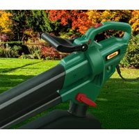 Green and black Webb 3300watt garden blow vacuum with ergonomic handle and red trigger button.