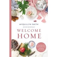 "Welcome Home book by Myquillyn Smith, featuring cozy home decor items like pinecones, leaves, and ornaments on the cover"