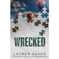"Wrecked book cover with hot air balloons and puzzle pieces against a blue sky, author Lauren Asher"