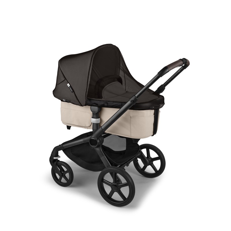 Black mosquito net designed for Bugaboo Fox, Donkey, and Kangaroo strollers, featuring a breathable mesh material and a fitted design over a beige stroller bassinet.