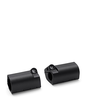 Black plastic adapters designed for the Bugaboo Cameleon 3, featuring a curved shape and small holes for secure attachment to the Bugaboo Comfort Wheeled Board.