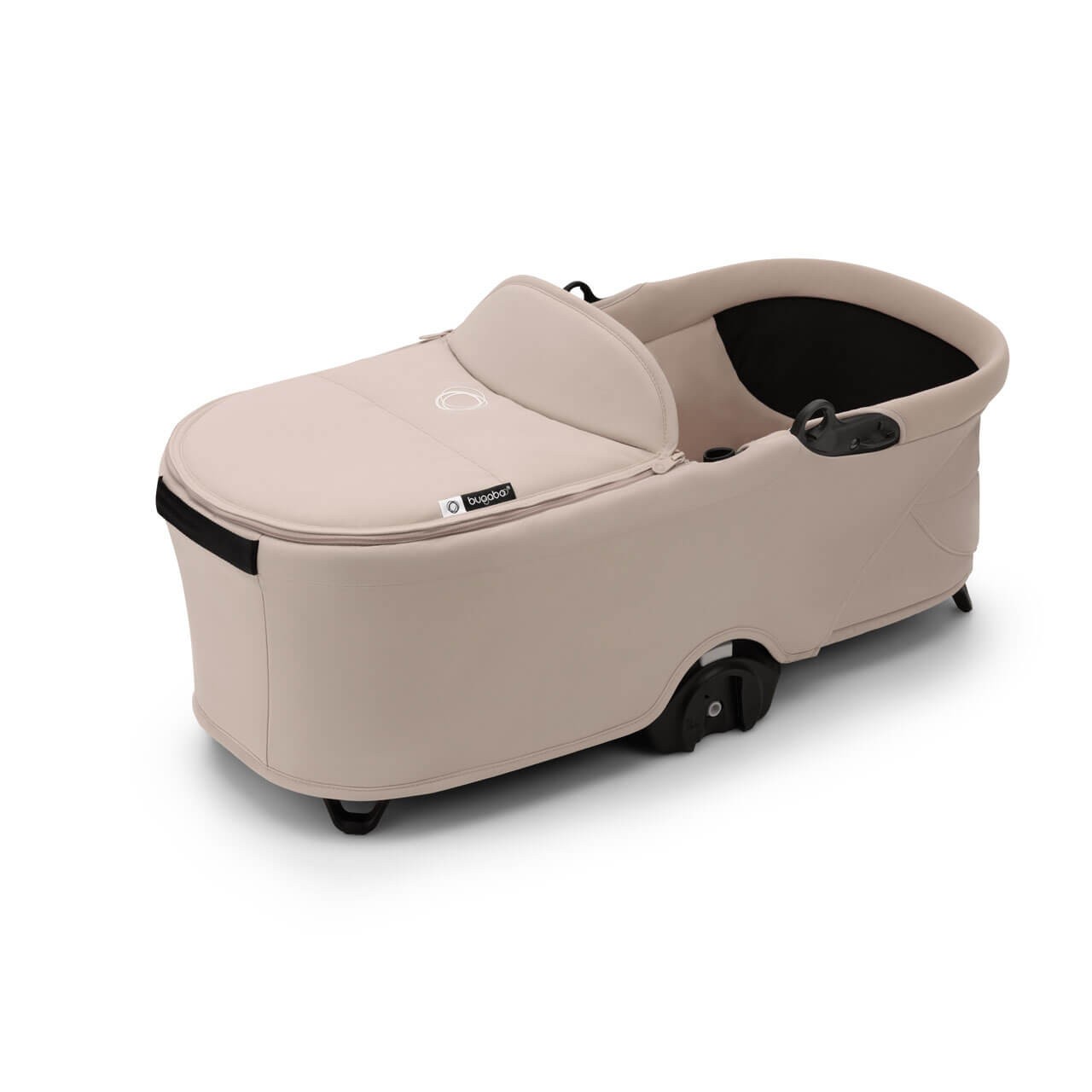 Desert taupe carrycot with a soft fabric exterior, a padded interior, and a sleek design featuring a removable canopy and wheels for easy mobility.