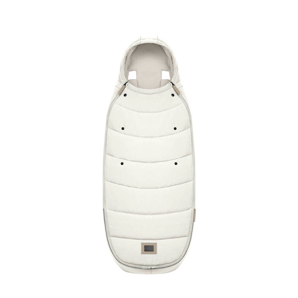 Off-white Cybex Platinum Footmuff featuring a quilted design, soft fabric, and a cozy hood, ideal for keeping children warm in strollers.