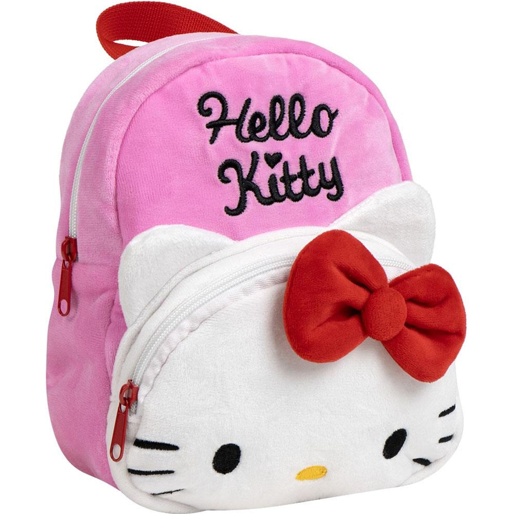Pink plush backpack featuring Hello Kitty's face, with a red bow and embroidered logo, complete with a front zip pocket and red carry handle.