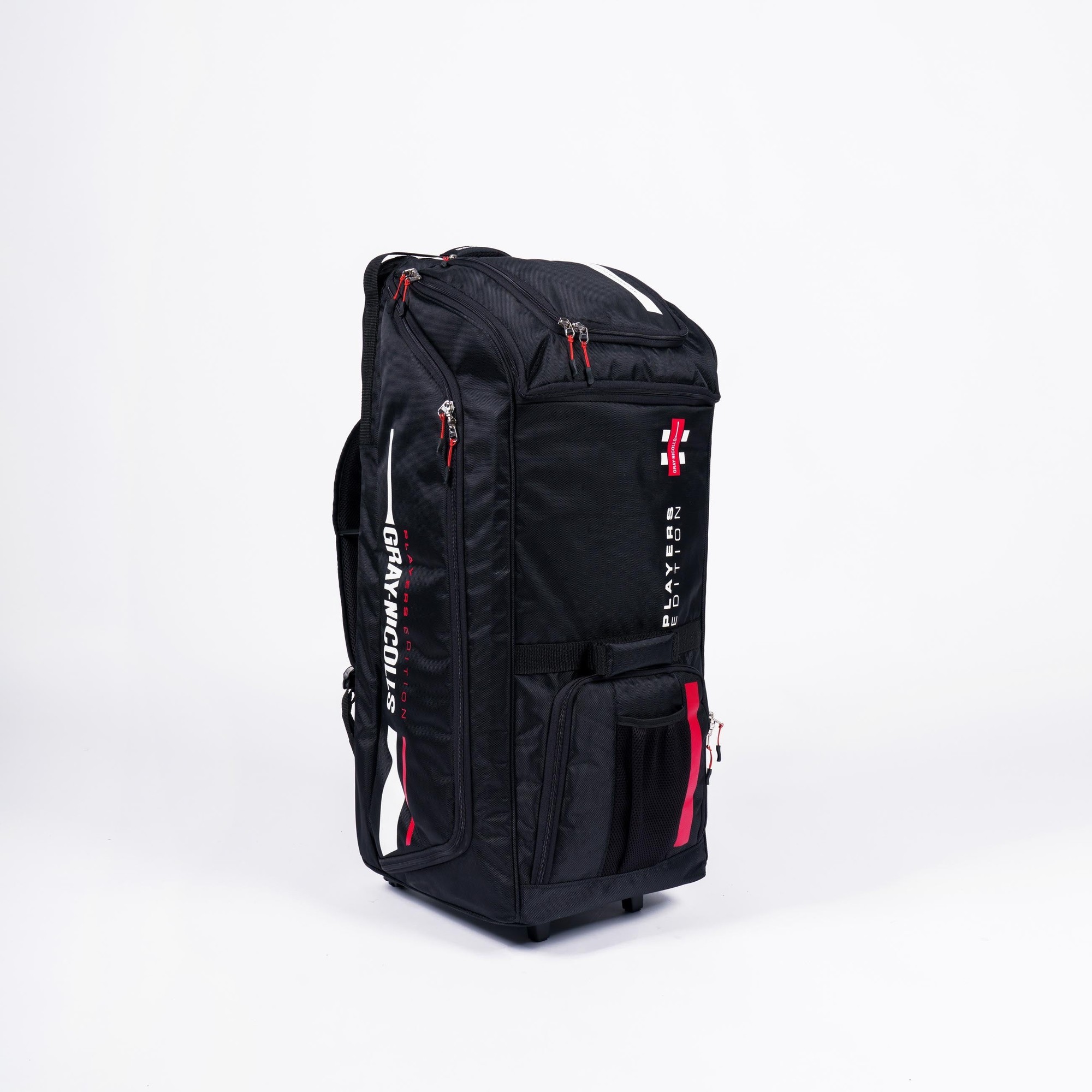 Gray-Nicolls Players Edition Wheelie/Duffle in black features durable fabric, multiple zippered compartments, a telescopic handle, and wheels for easy transport.