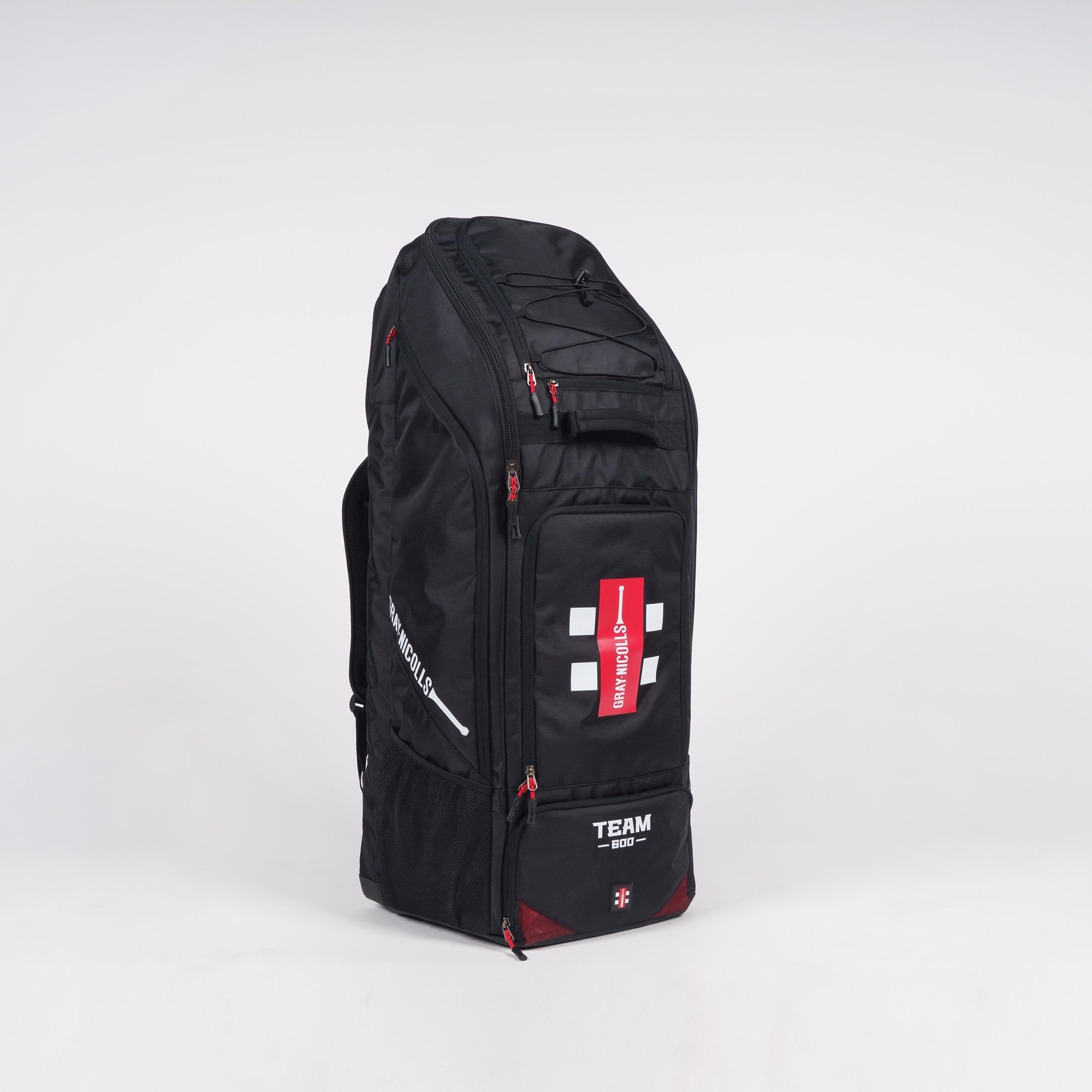 Black Gray-Nicolls Team 600 Duffle Bag featuring a large main compartment, red accents, and a prominent logo on the front, designed for sports and travel.