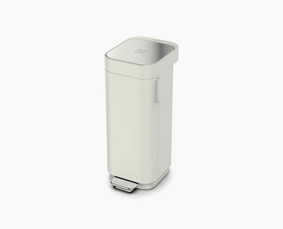 Grey 40L Joseph Joseph® Porta Easy-empty Petal Bin with a sleek design, a foot pedal for hands-free opening, and a smooth, durable finish.