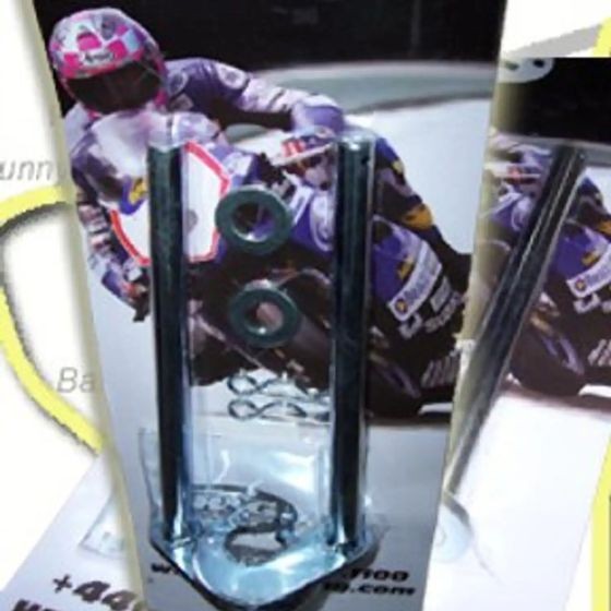 R&G Motorcycle Paddock Stand Hooks in shiny metal with a sleek design, featuring two circular rubber inserts for secure fitting and enhanced grip.