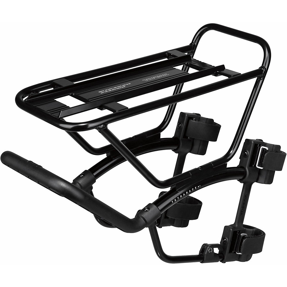 Black metal fork rack designed for mountain bikes, featuring a sturdy frame, adjustable clamps, and a flat platform for carrying gear.