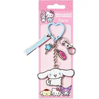 Keychain with Hello Kitty and Cinnamoroll charms, blue heart ring, pink donut, and star on a pink backing card.