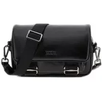 Black Guess Boston shoulder bag with flap closure, silver buckle accents, and adjustable strap.
